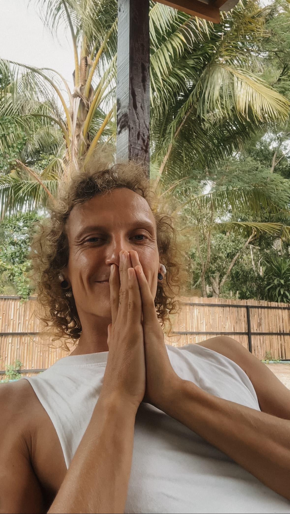 Markus with hands in namaste